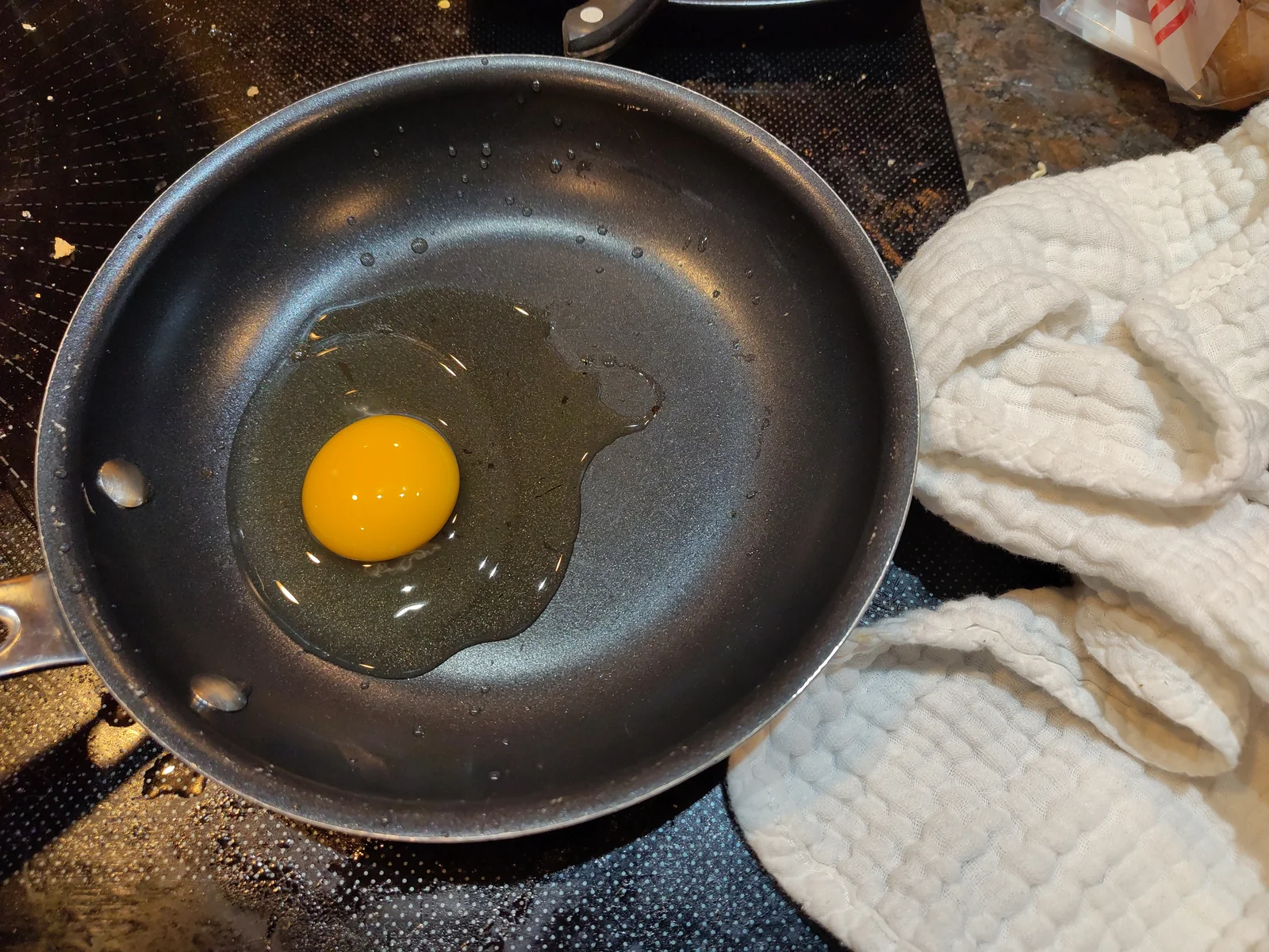 Raw egg in pan - complete failure